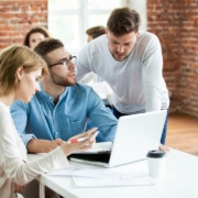 how to request a single case agreement before PHP admission - behavioral health billing and admissions team reviewing payer contract terms in an office meeting