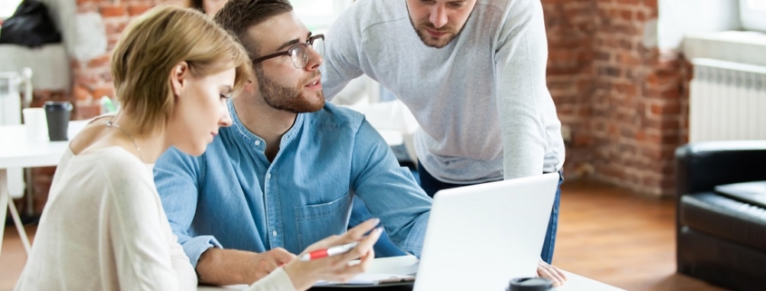 how to request a single case agreement before PHP admission - behavioral health billing and admissions team reviewing payer contract terms in an office meeting