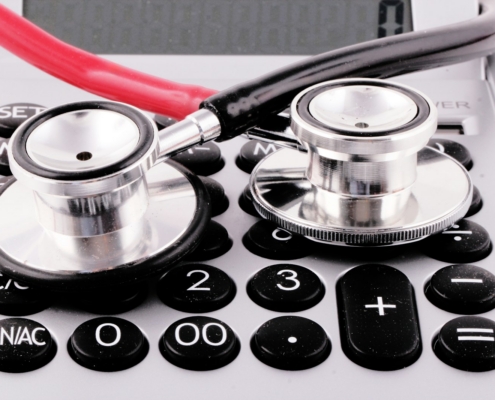How long does prior authorization take for residential rehab: stethoscope resting on a calculator for behavioral health billing